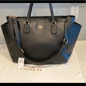 Coach Gym bag, baby bag, or traveling accessory.